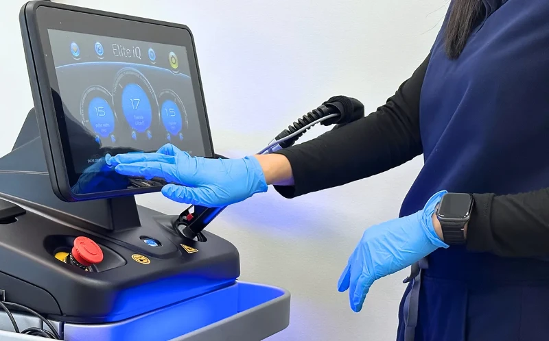 Doctor operating the Elite iQ laser system at Soluna Medical in Las Vegas