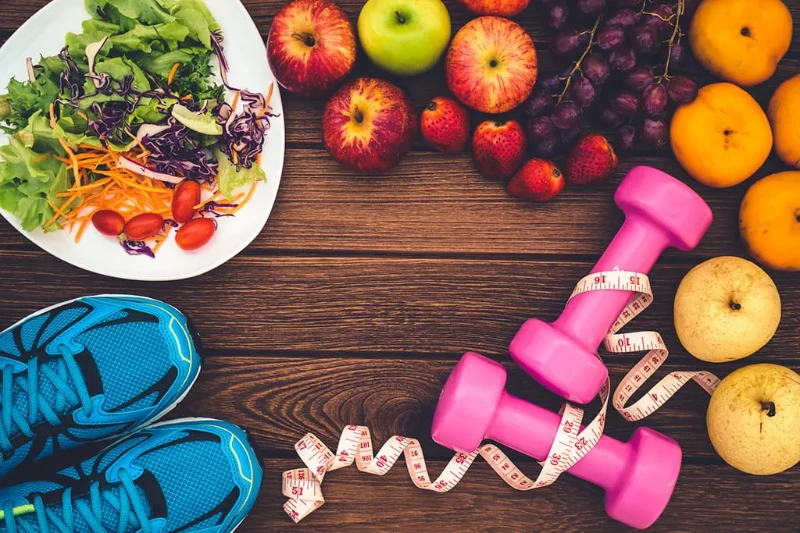 food and exercise equipment that symbolizes the weight loss program at soluna medical